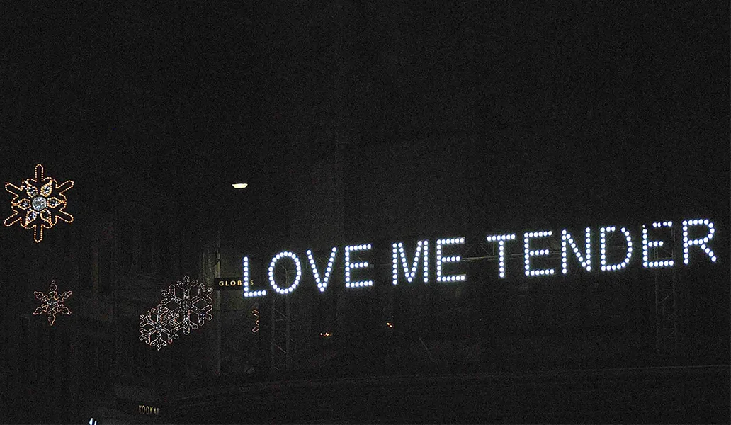 lights arranged to read Love me tender and snowflake decorations in Lausanne
